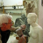 26/12/2007 L'artiste sculpte le visage de la statue